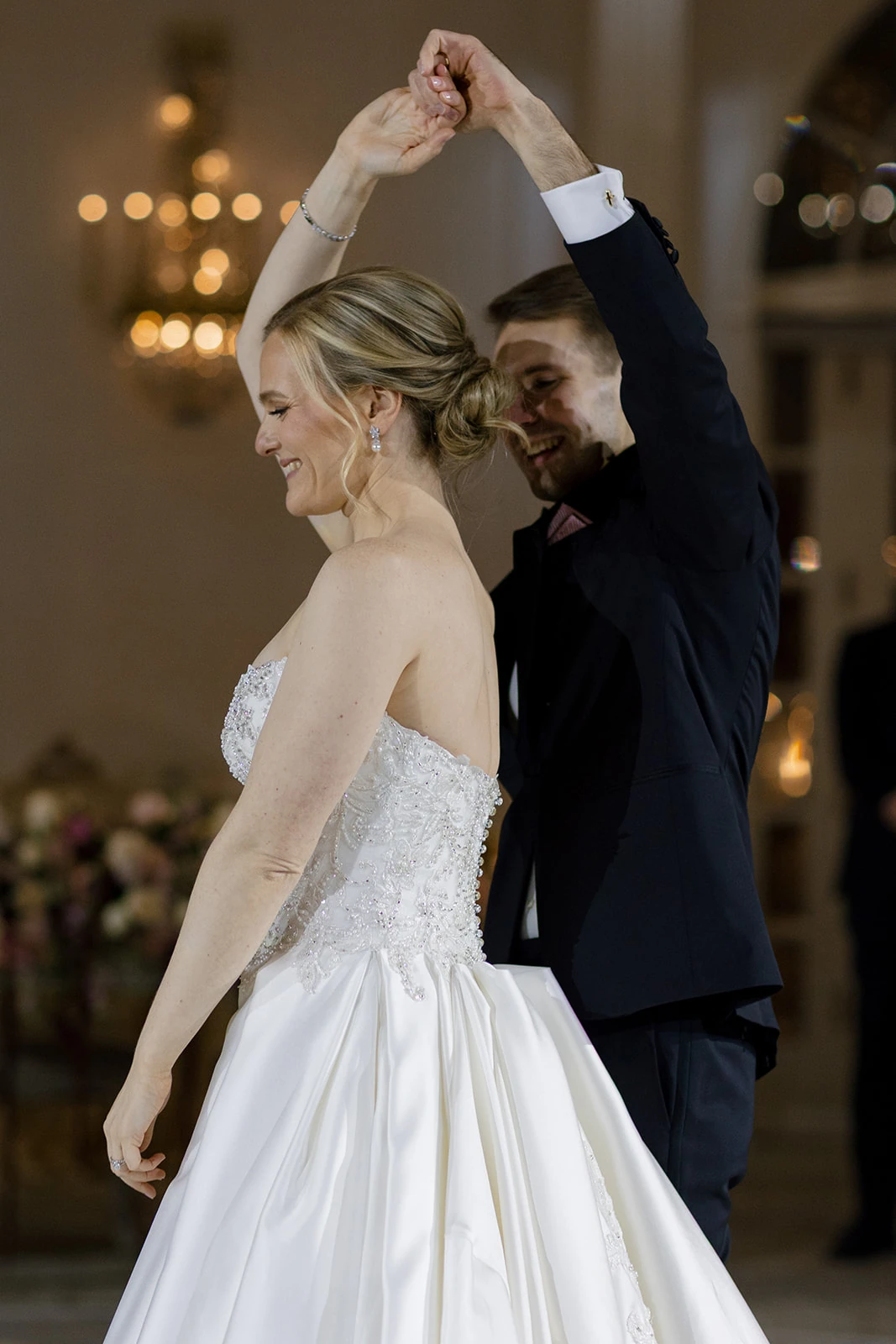 A newlywed couple dancing